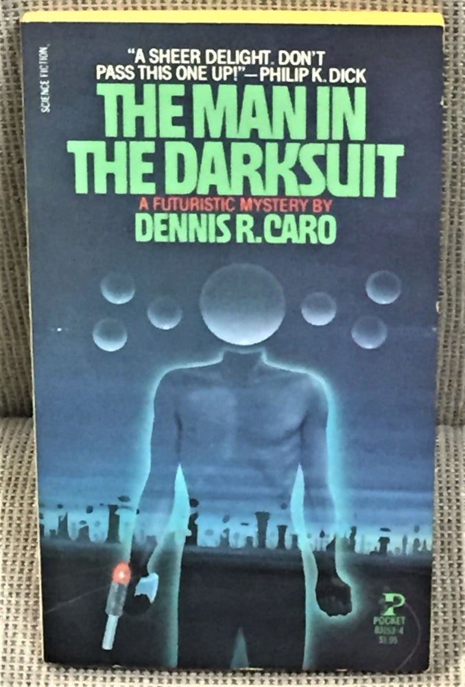Item #60083 The Man in the Darksuit. Dennis R. Caro.