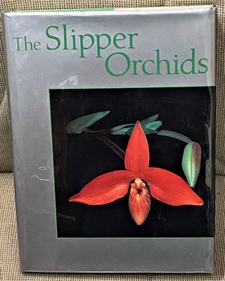 Item #63105 The Slipper Orchids. Catherine Cash