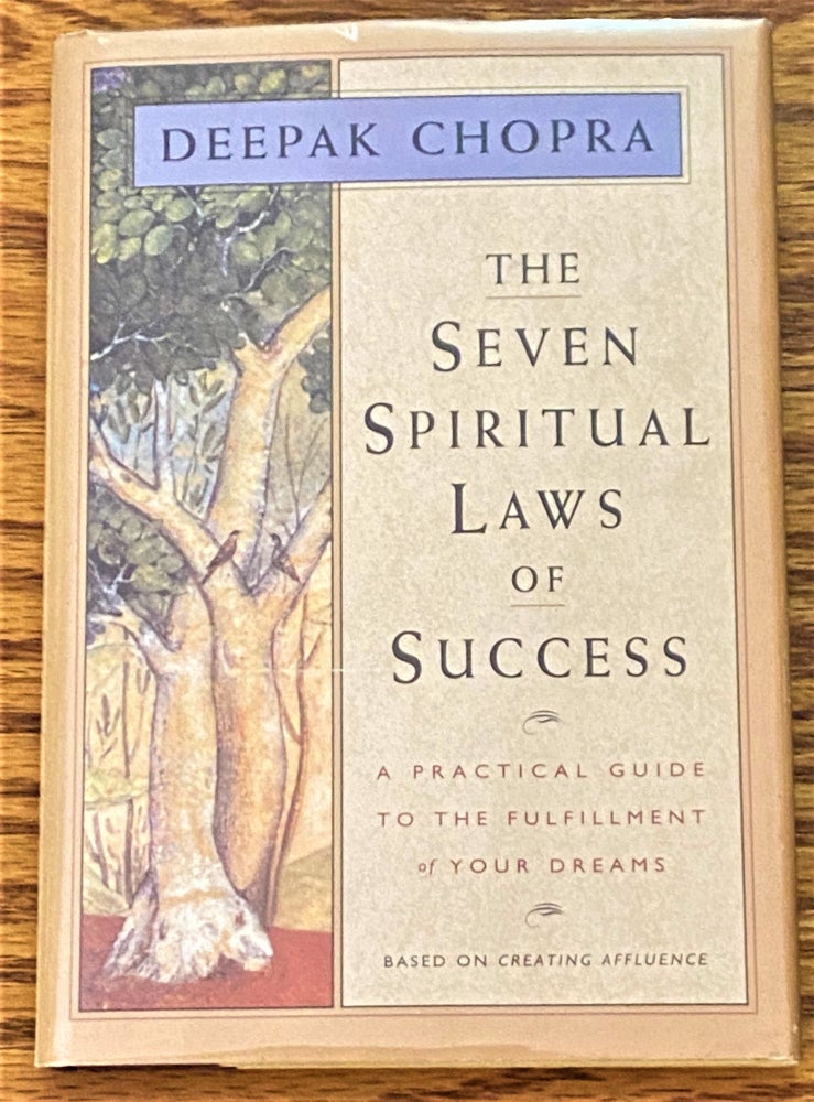 Item #64439 The Seven Spiritual Laws of Success, a Practical Guide to the Fulfillment of Your Dreams. Deepak Chopra.